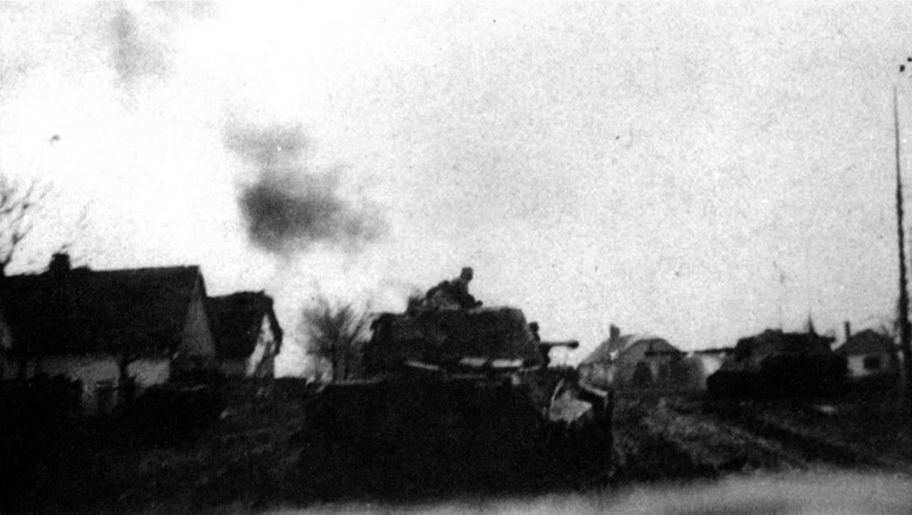 12 Tiger II in combat